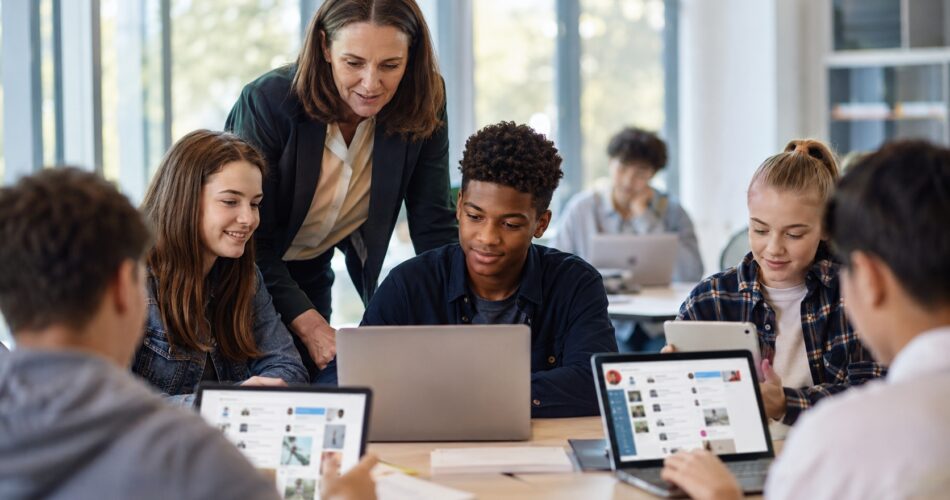 Teacher and students using social media as part of an online learning activity